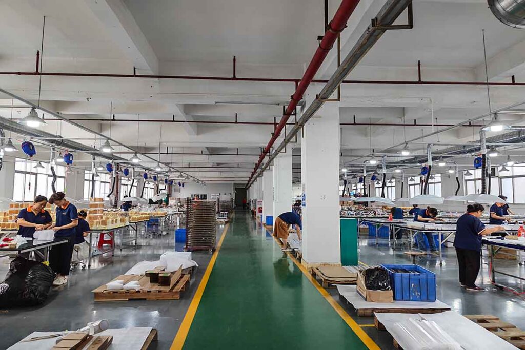 Acrylic fabrication process for custom retail display products at Yuefeng Display factory